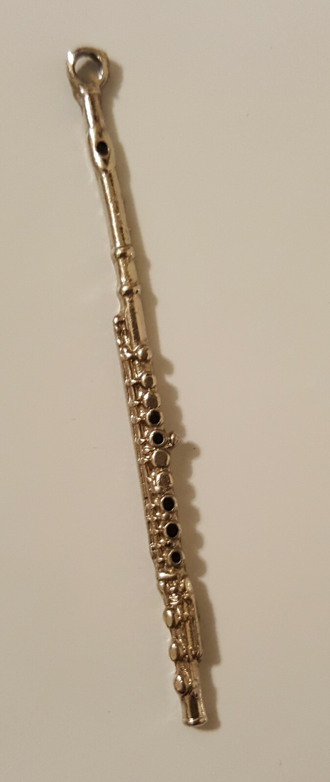 Silvertone Future Primitive USA with Black Enamel Miniature Flute Charm 2″ Long