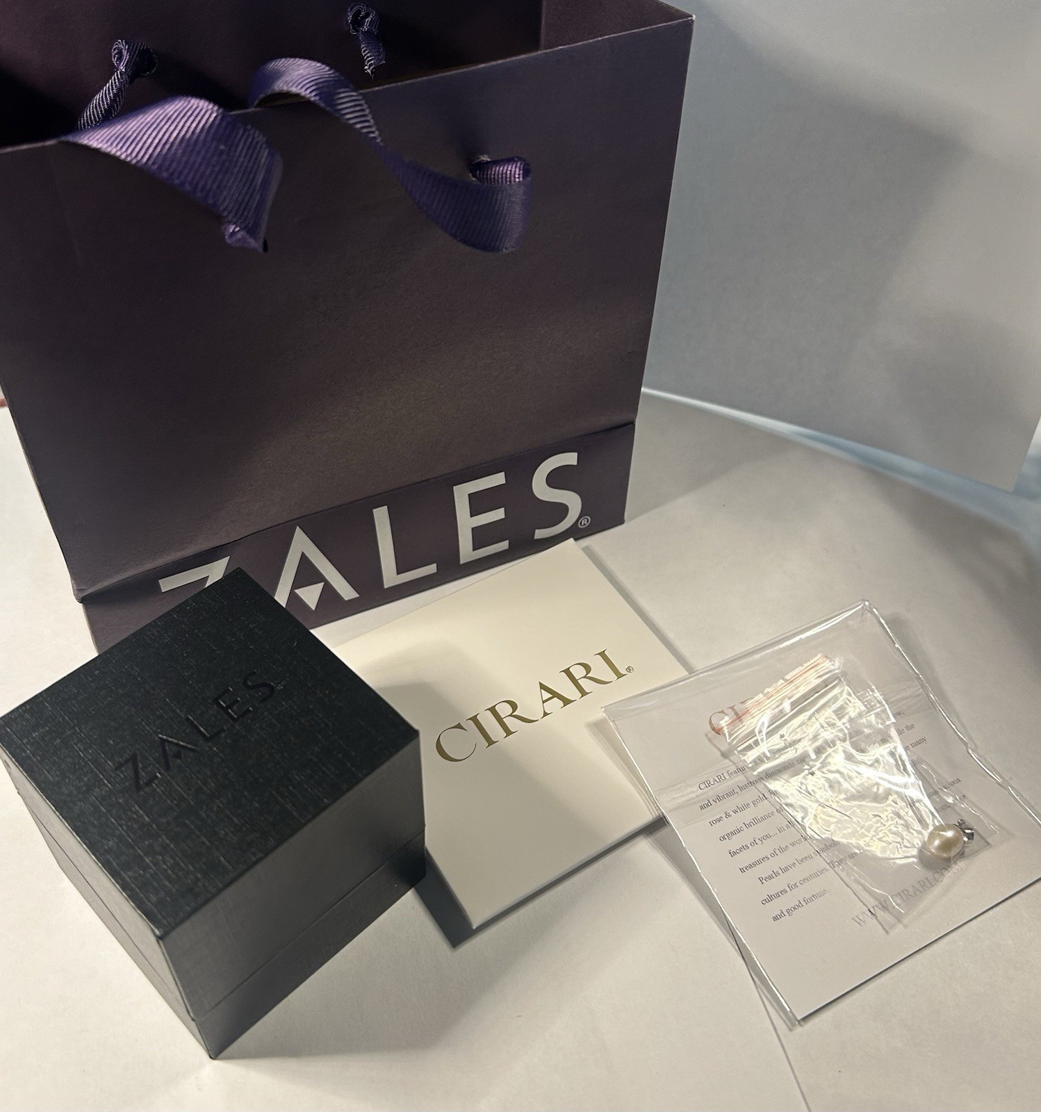 CIRARI 7.00 mm Pearl Charm With Zales Presentation Box, Gift Bag & CIRARI Cloth