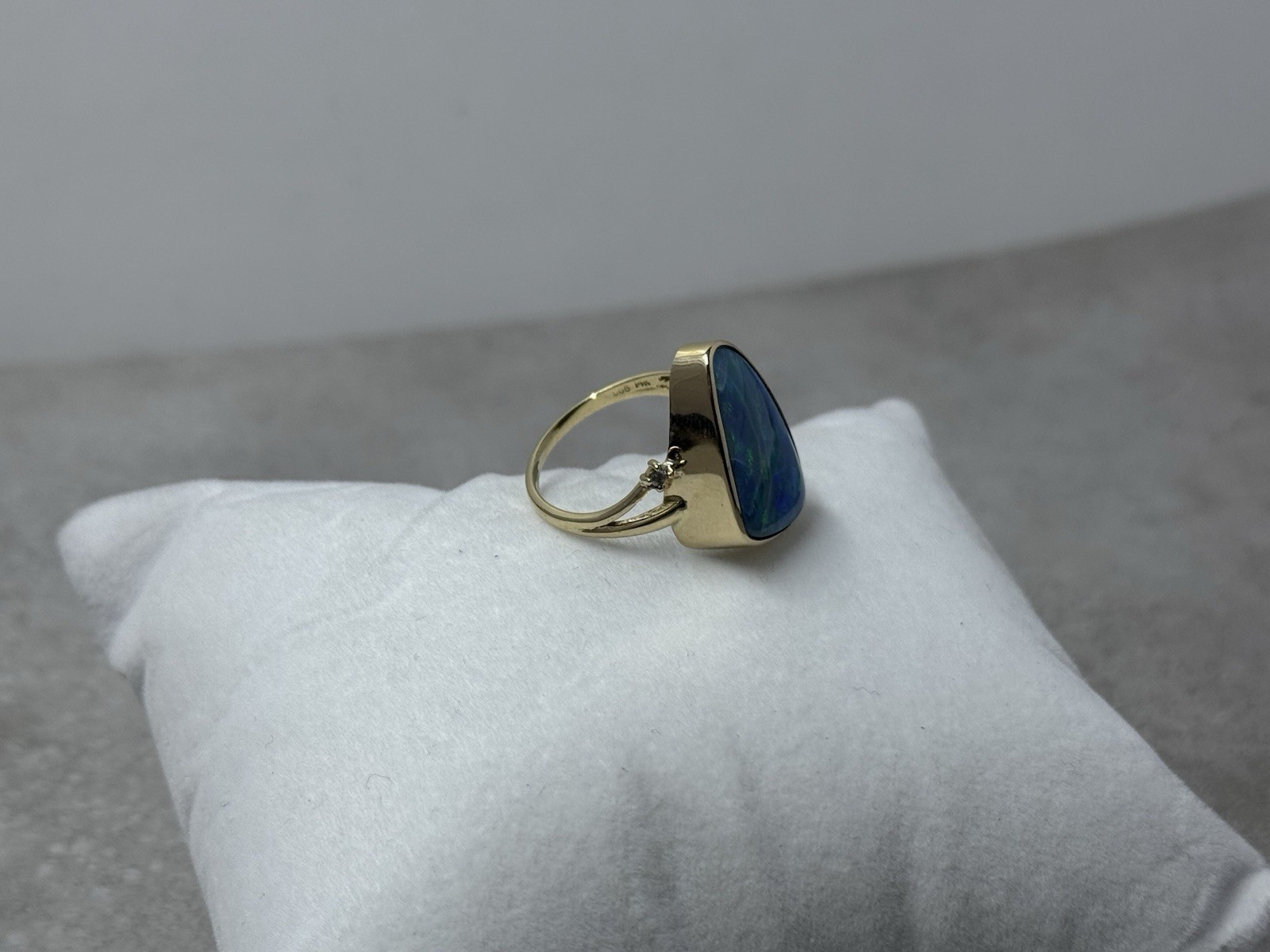 Natural Australian boulder opal with A 14k Gold ring And Diamonds. Ring size 8.
