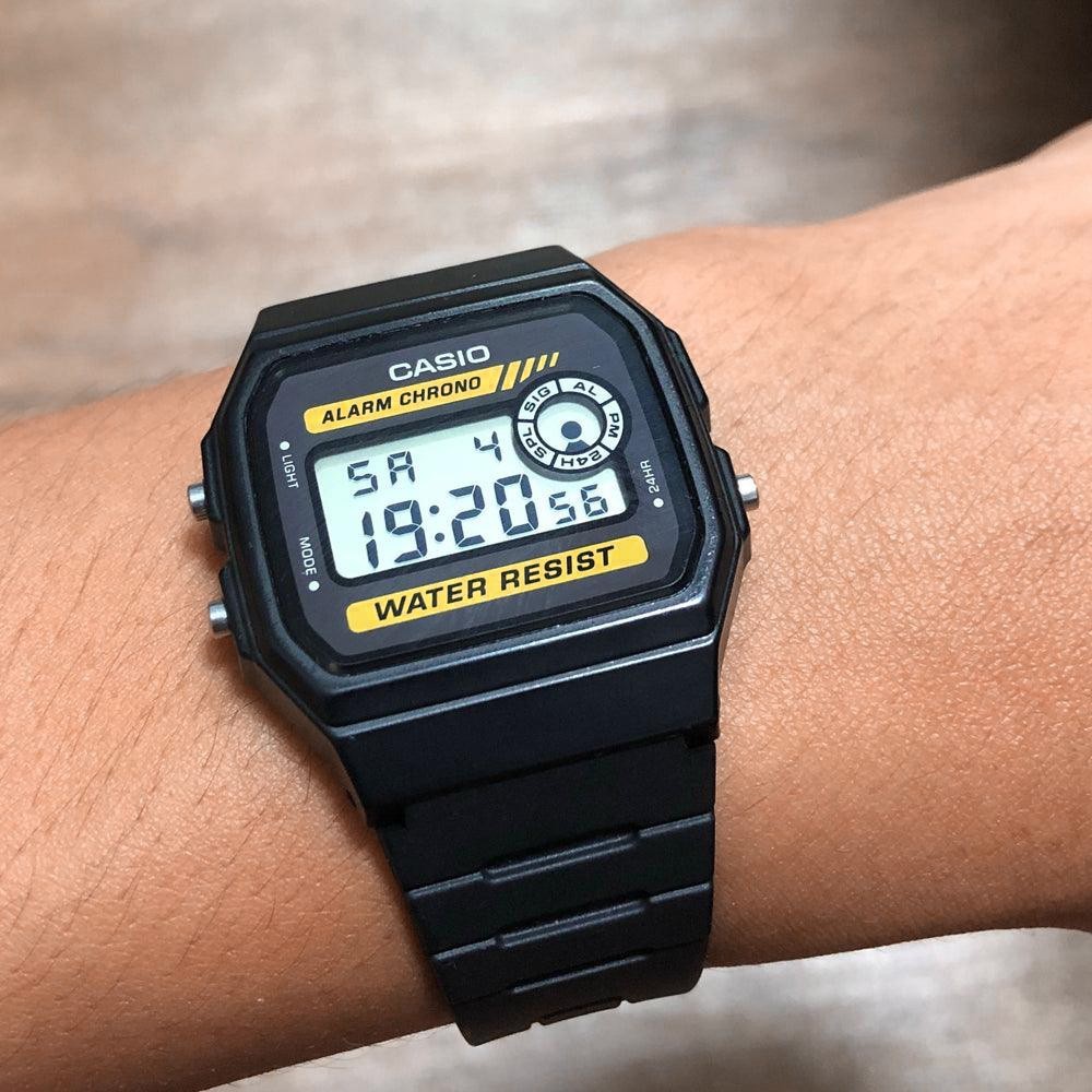 Casio F-94WA-9 Black Digital 30M WR Alarm Backlight Stopwatch Gold Accent Resin