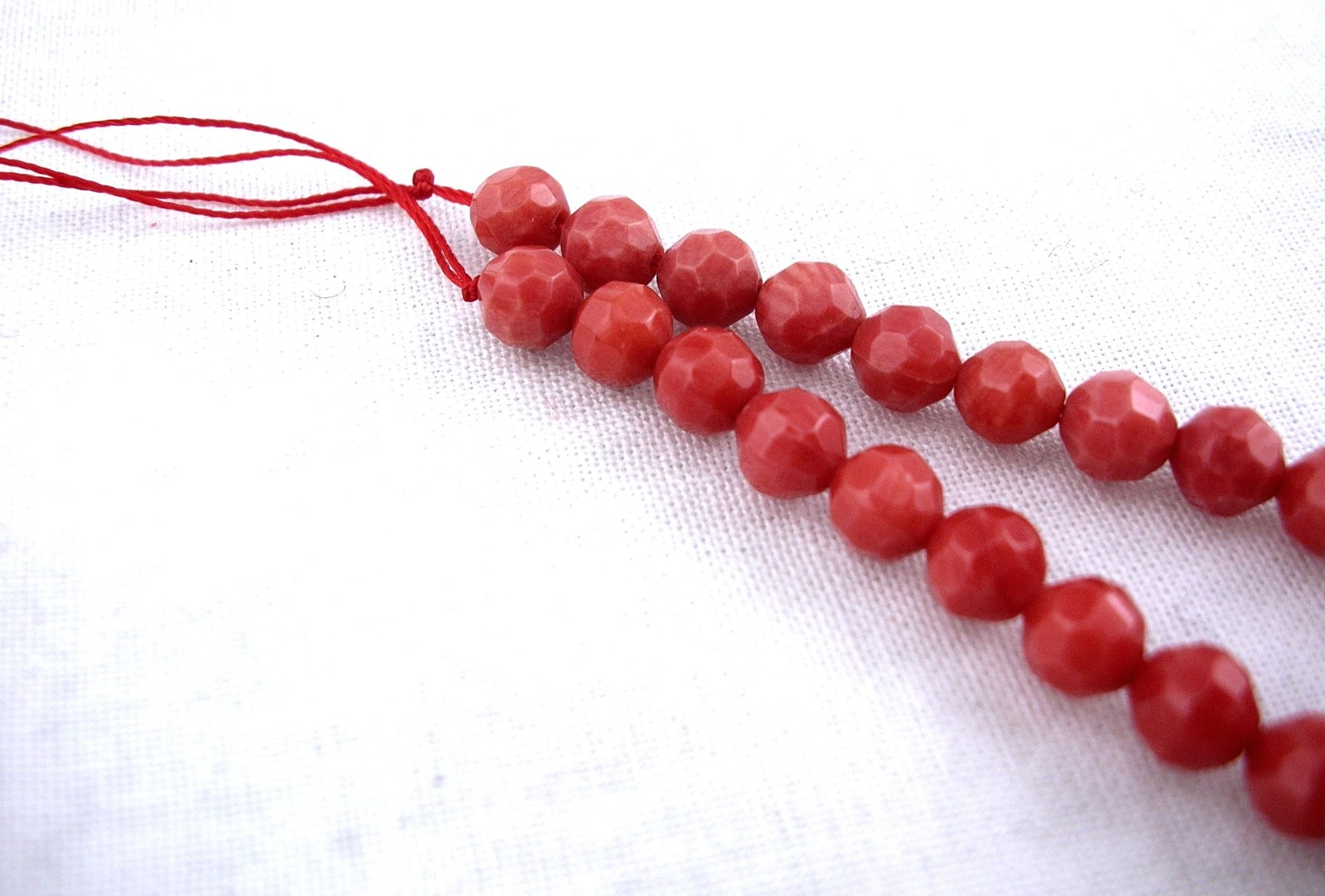 RED CORAL THREAD FACETED BEADS 5mm LENGTH 42 cm