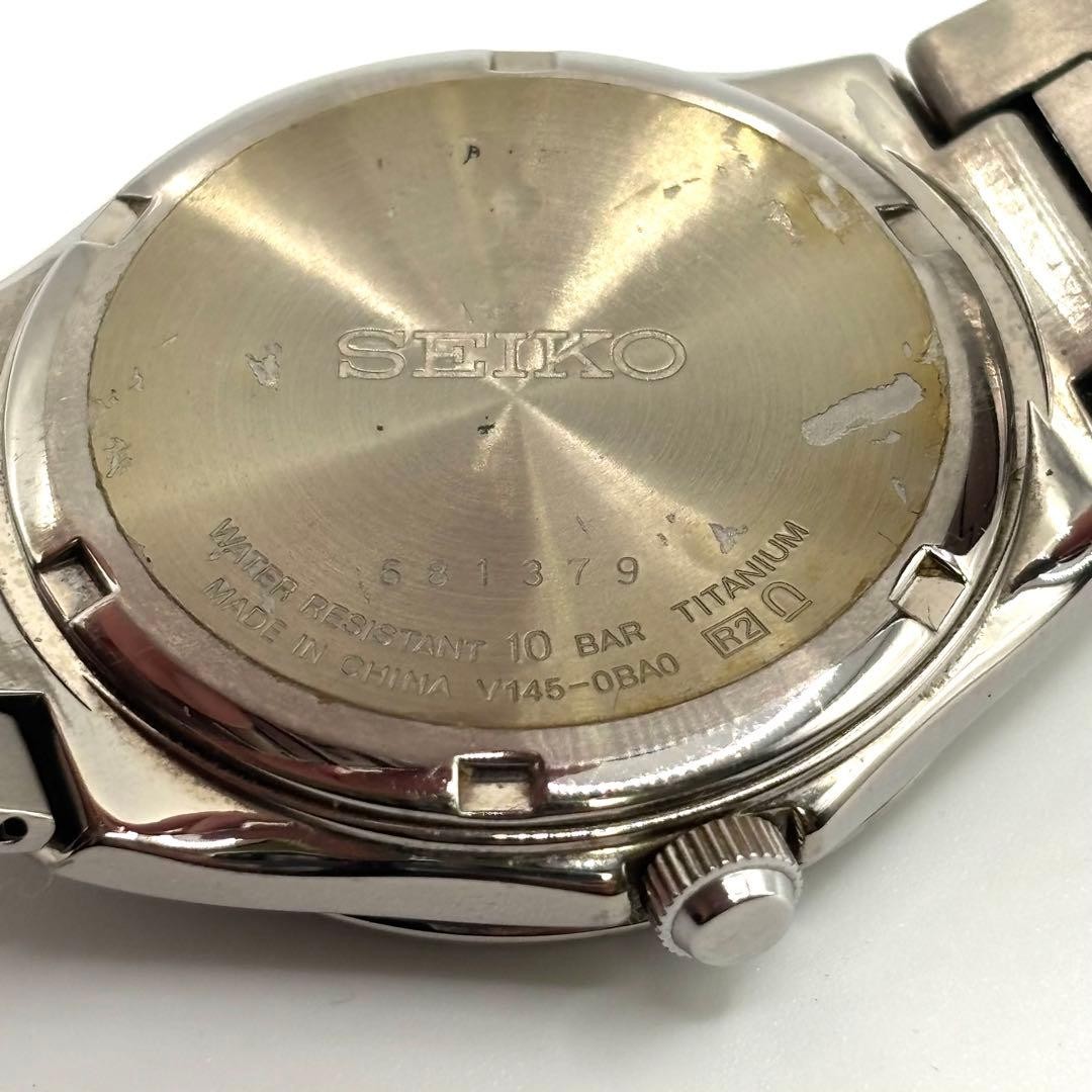 Working ,SEIKO solar-powered titanium watch with mother-of-pearl dial,From Japan