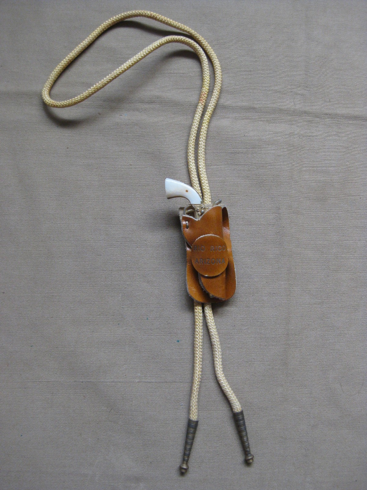 VINTAGE RIO RICO AZ MINI COLT PEACEMAKER SAA REVOLVER & LEATHER HOLSTER BOLO TIE