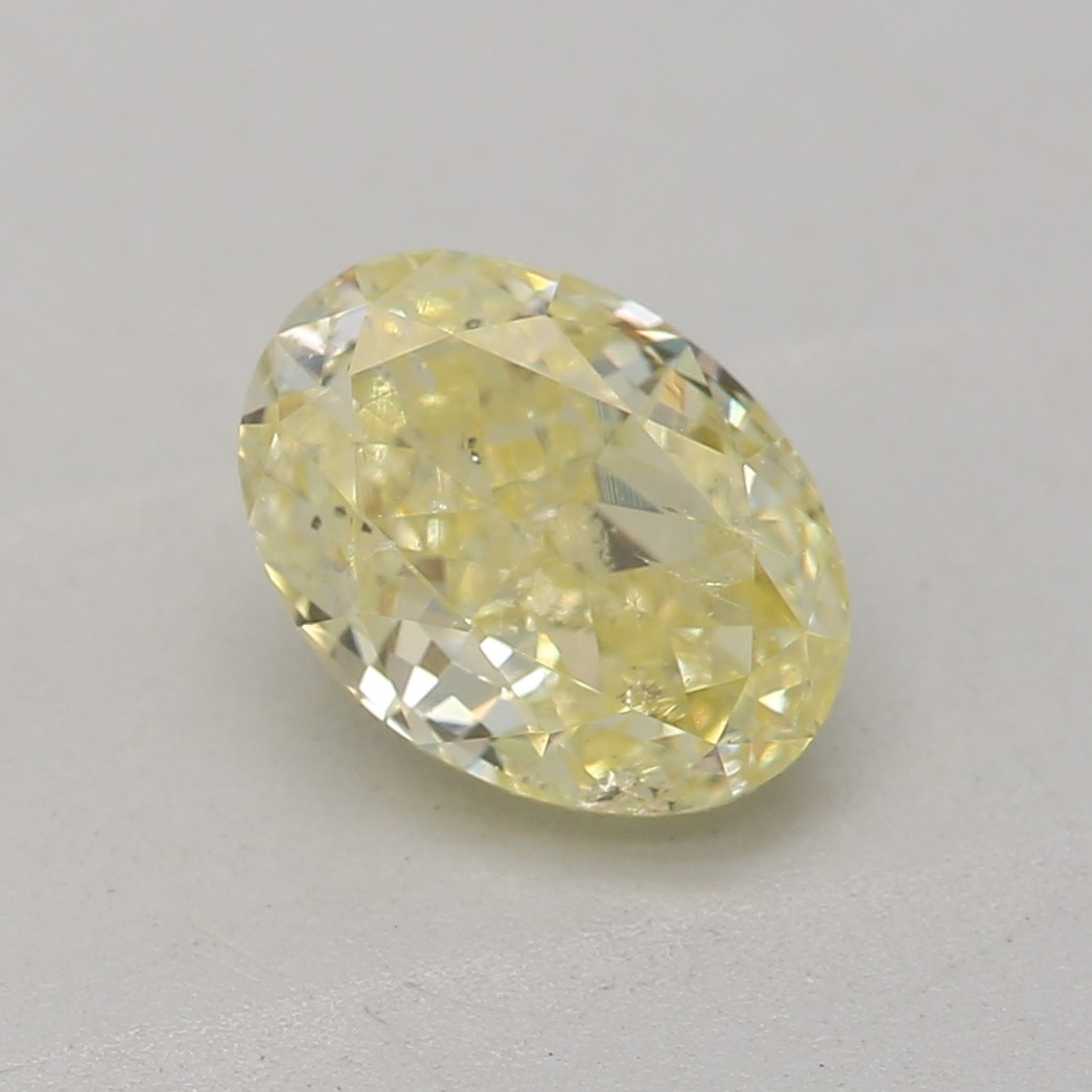 0.78 carat, Fancy Yellow, Oval Shape, I1 Clarity, GIA