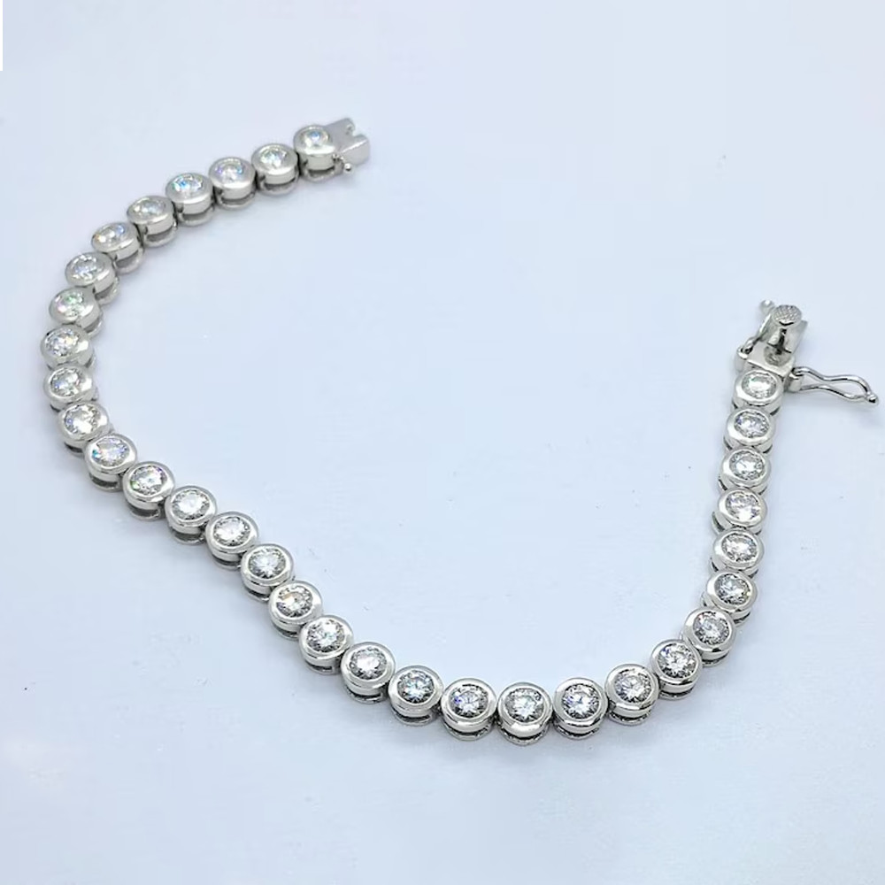 4 mm Round Cut Moissanite Bezel Set Tennis Bracelet In 14K White Gold Plated