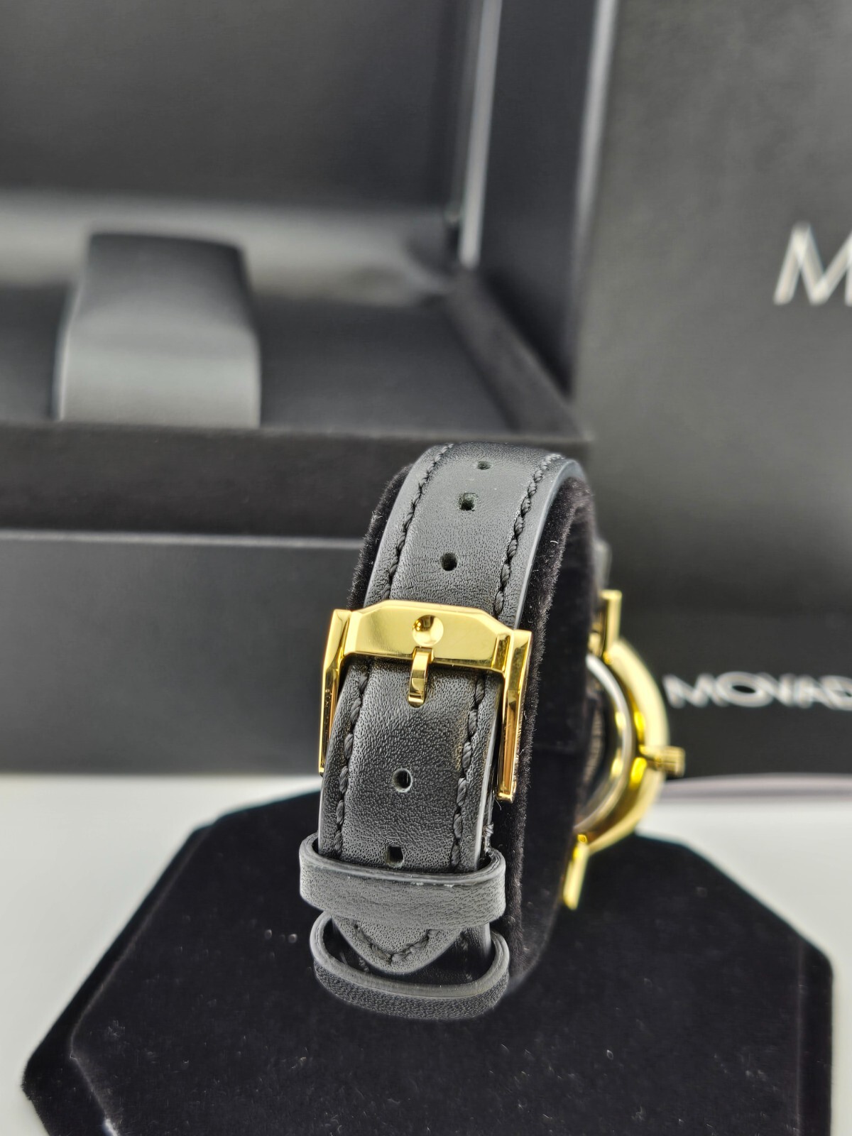 Movado Women’s Ultra Slim Black Dial Gold Tone Case Watch – 0607091 ($795 MSRP)