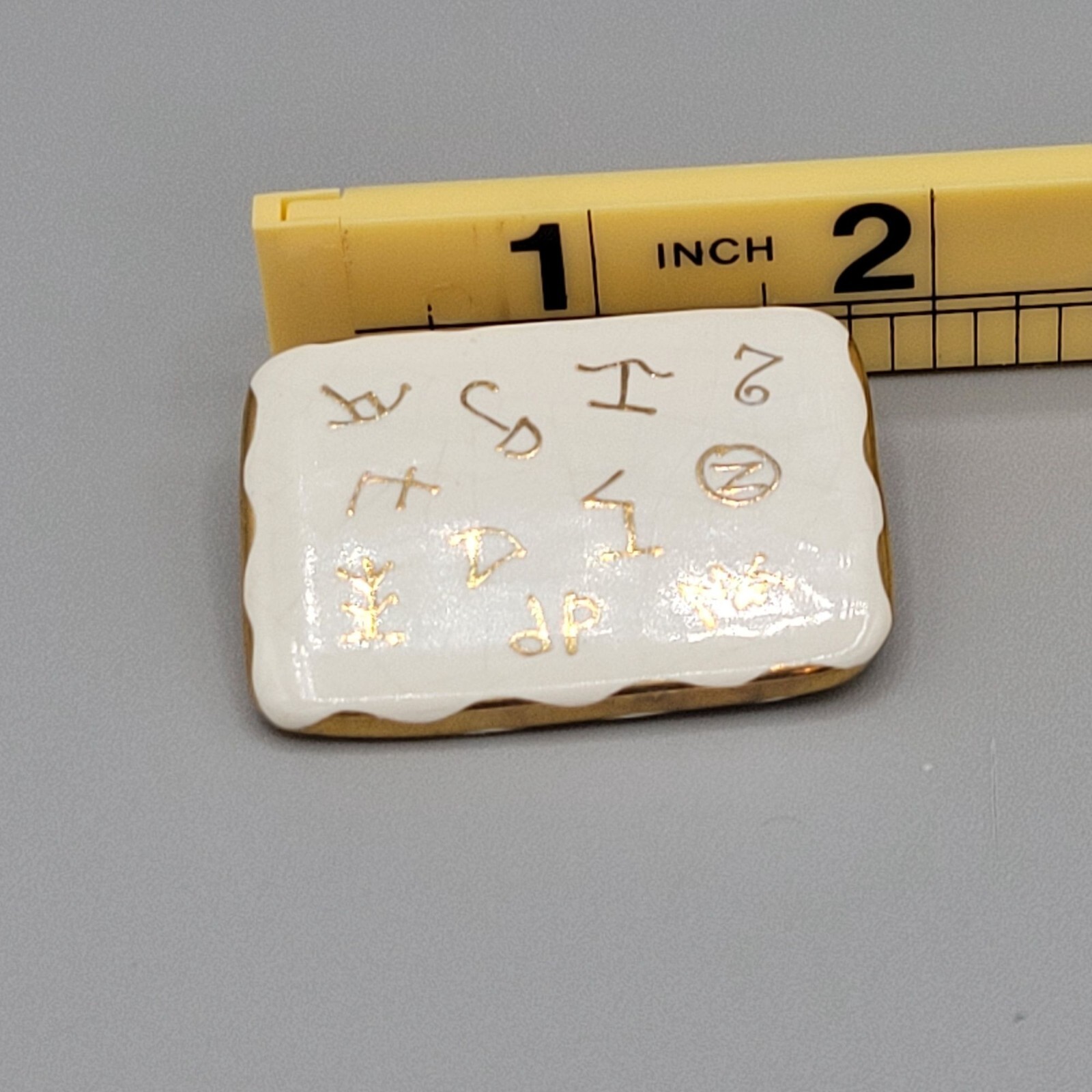Vintage Ceramic Enamel Brooch With Ancient Symbol Design & Gold Tone Trim