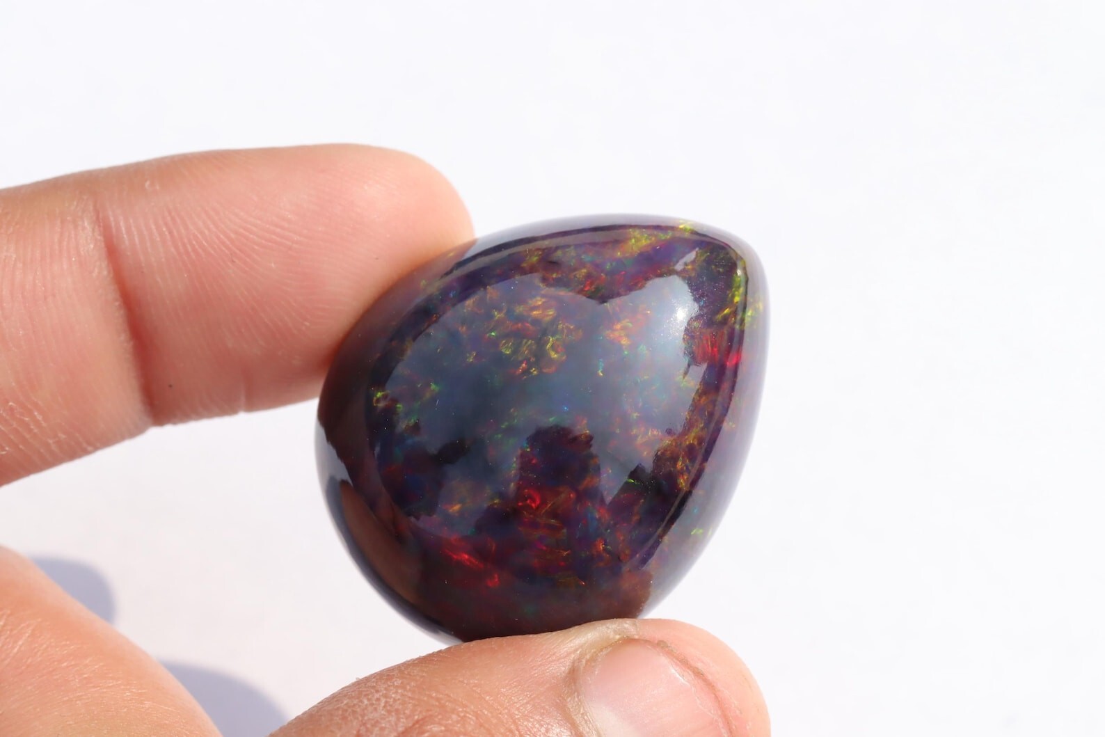 59.95 Carat Ethiopian Black Opal Cabochon 31x26x15 MM Pear Shape Welo Fire Opal