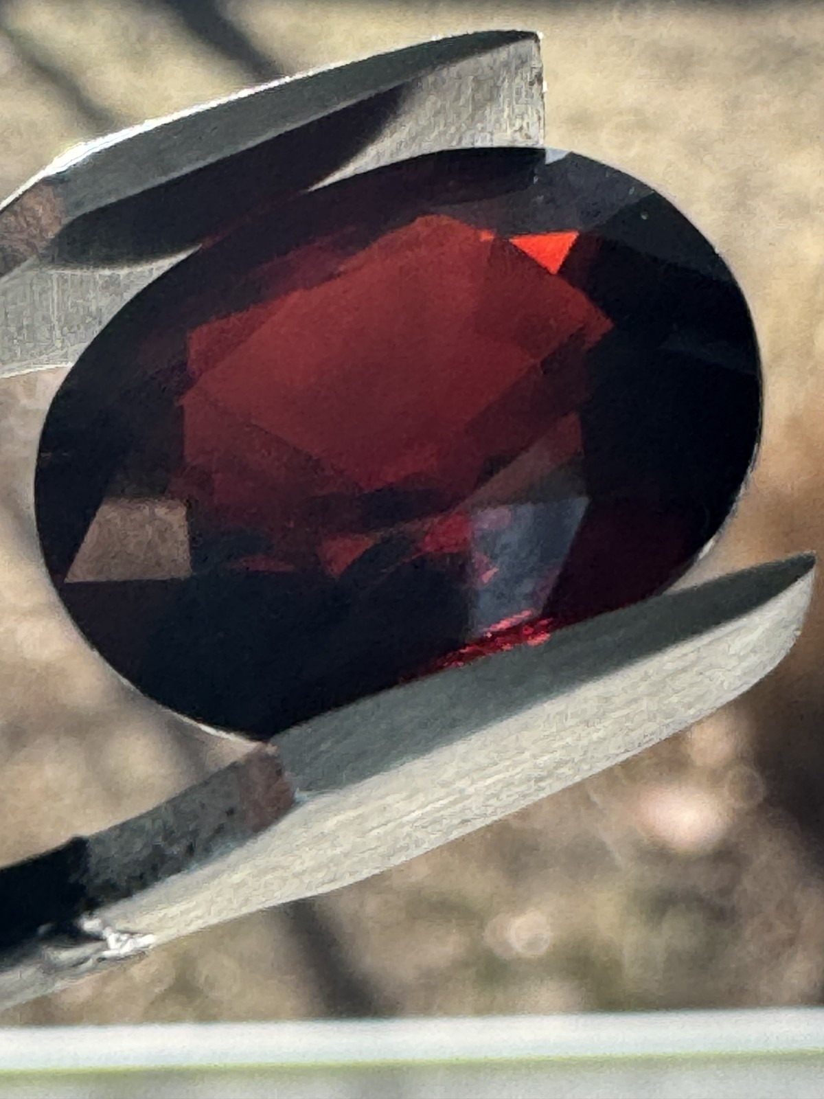 9.15 Carat, Dark Orange Red MOZAMBIQUE GARNET, 14x11mm Oval, Eye Clean.
