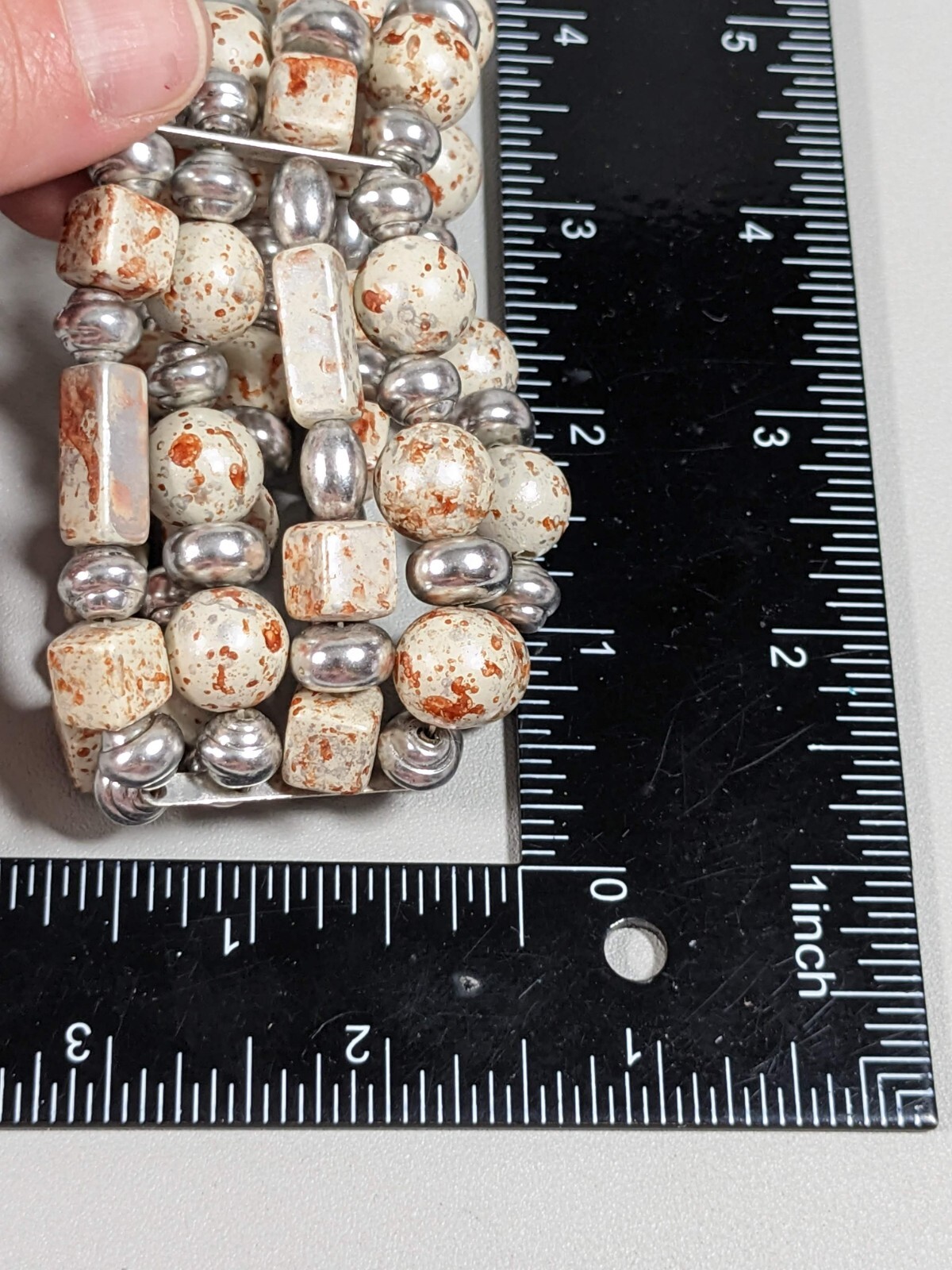 Silver Tone Ivory Color Brown Splatter Four Row Wide Stretch Bracelet 6 inches