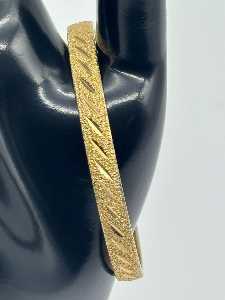 Vintage Monet Etched Textured and Shiny Gold-Tone Bangle Bracelet Signed 8-1/8″