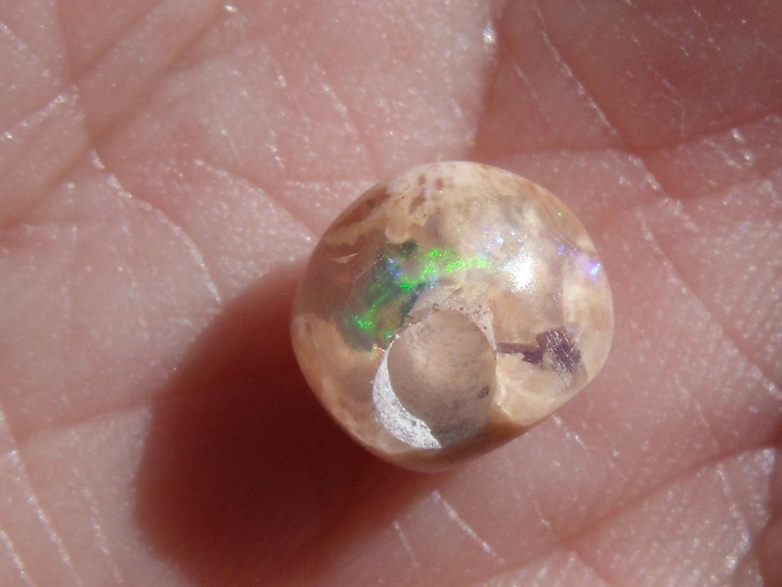 1.91 Ct. Round Cut Mexican Cantera fire opal bead.