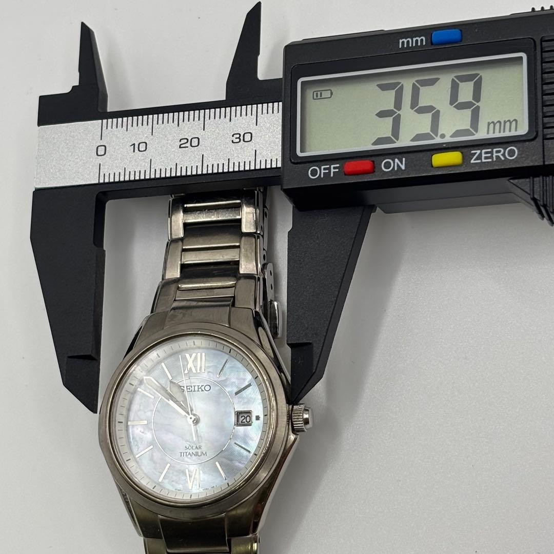 Working ,SEIKO solar-powered titanium watch with mother-of-pearl dial,From Japan