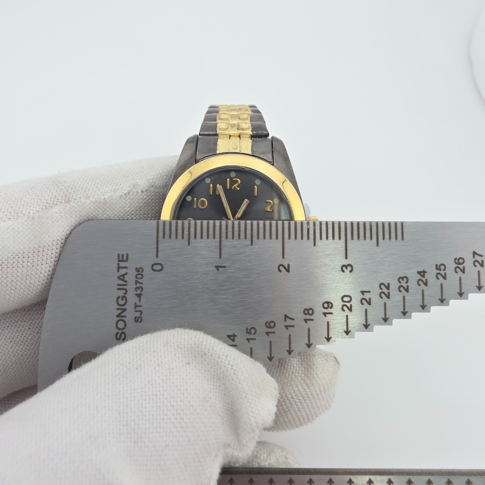 M.Z. BERGER & CO. Ladies Stretch Watch H2O Resistant Black Gold Ion Plated 6.25″