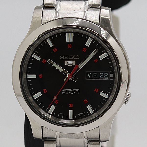 operational Seiko Seiko5 7S26 02J0 AT Automatic Black Dial Day Date Transparent