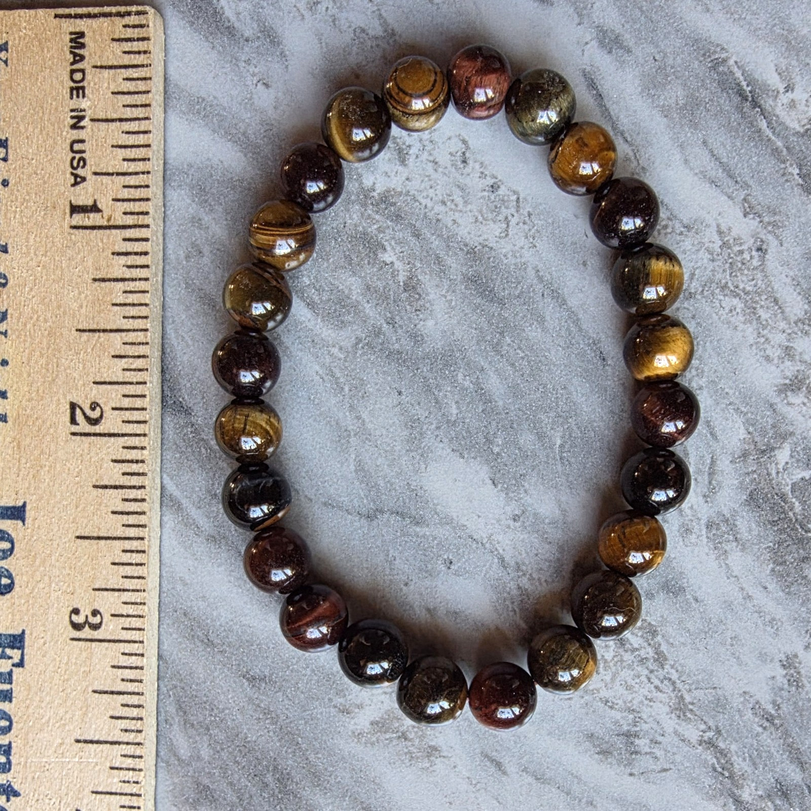 Natural Tiger’s Eye Stretch Bracelet 8-8.5mm Round, 6.50-8.00 Inches 75.0 ctw