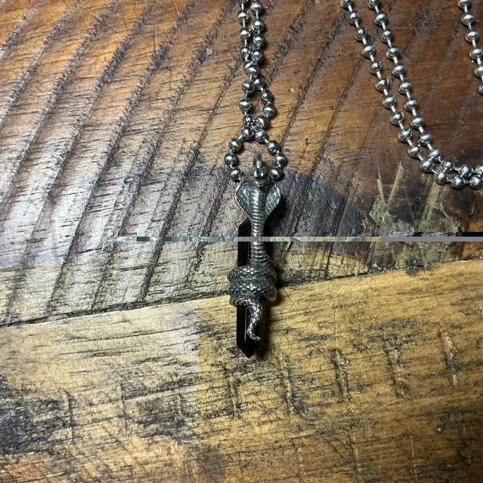 Sterling Silver Cobra snake Wrapped Around Onyx Pointed Crystal Necklace