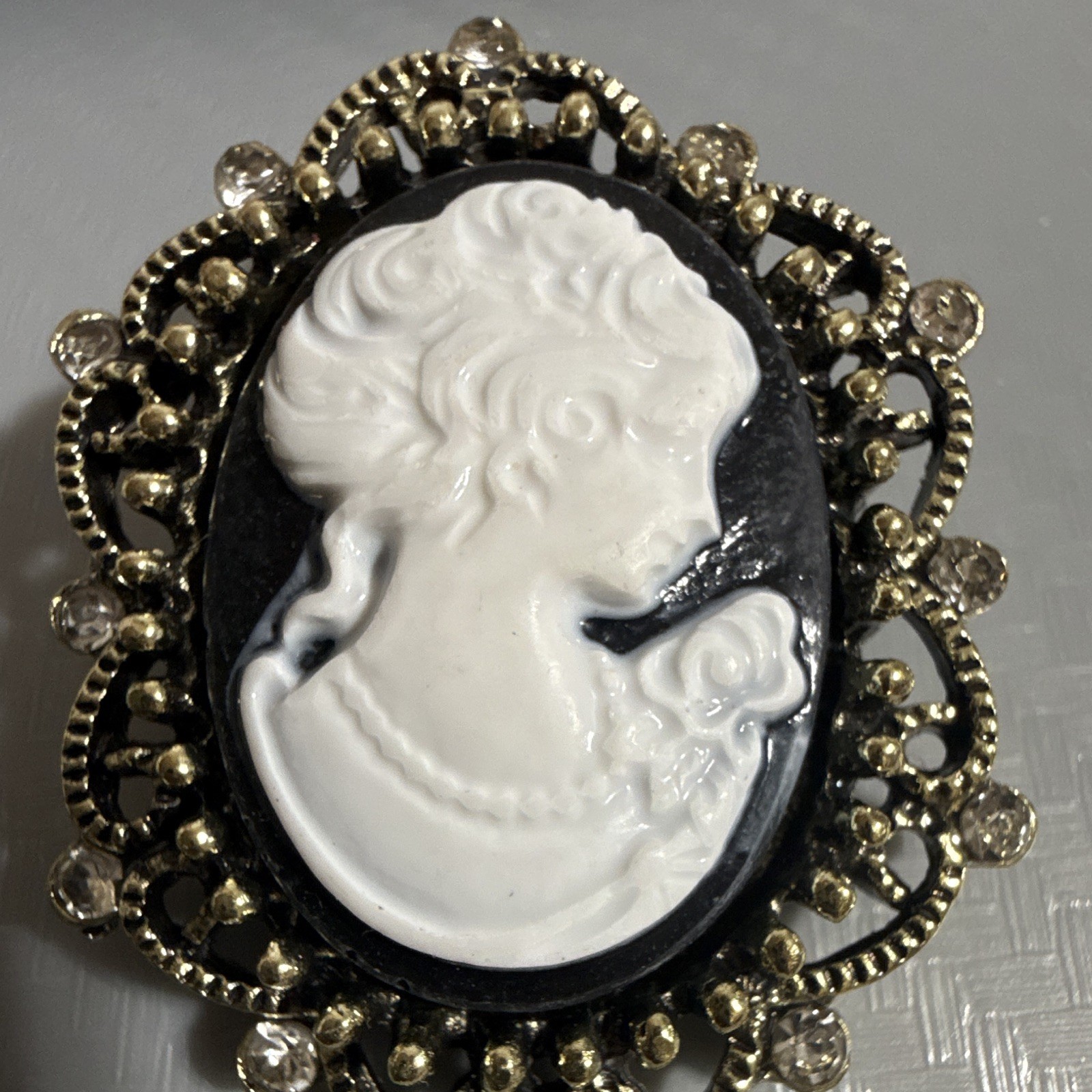 Faux Oval Cameo Portrait Brooch Pin Gold Tone Black/White w Rhinestones