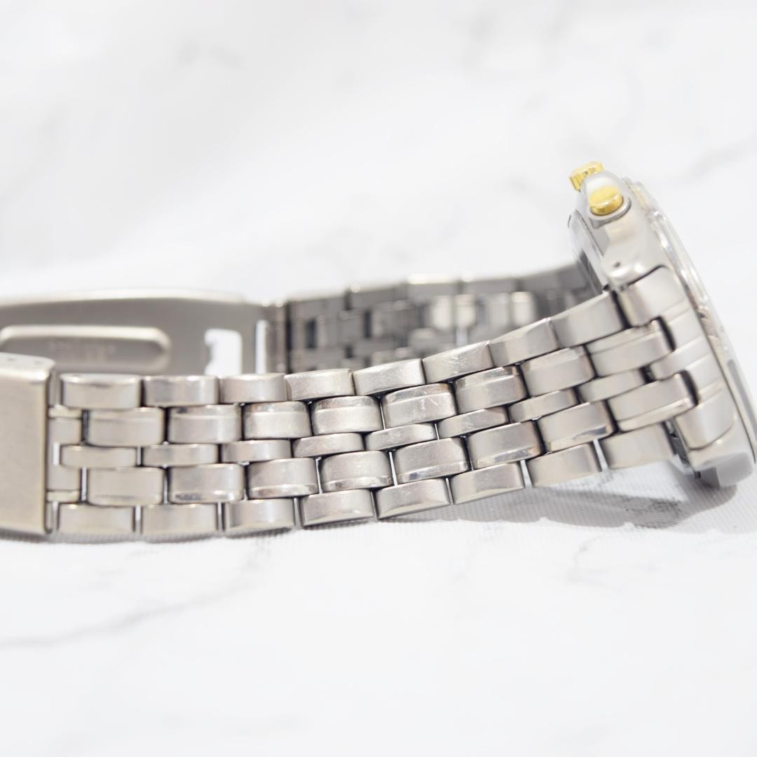 1996 SEIKO Spirit AGS Titanium watch with date display, non-functional.