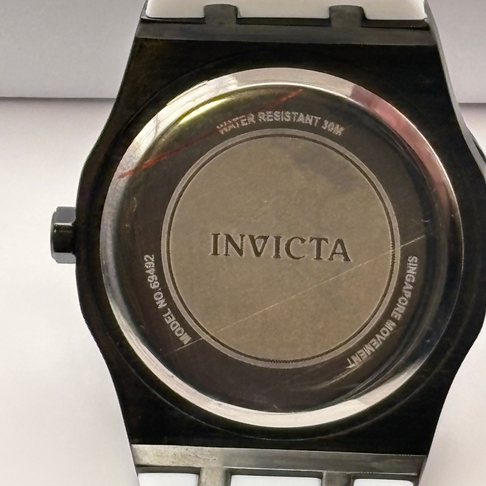 Invicta Speedway Rim 69492 Men’s 42mm Black Skeleton Dial White Silicone Watch