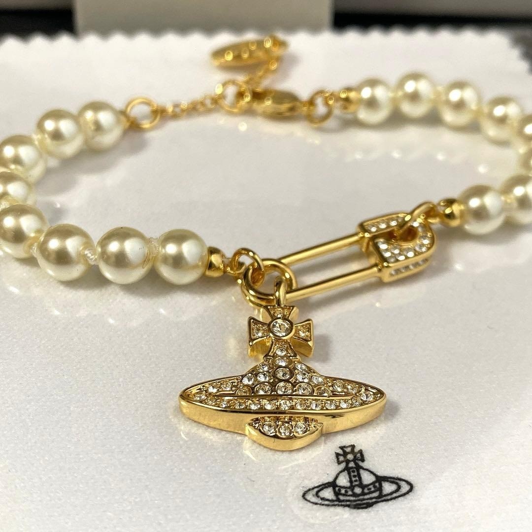 Vivienne Bracelet Mini Bas Relief Pearl Clip Orb Gold w/Pouch IN BOX