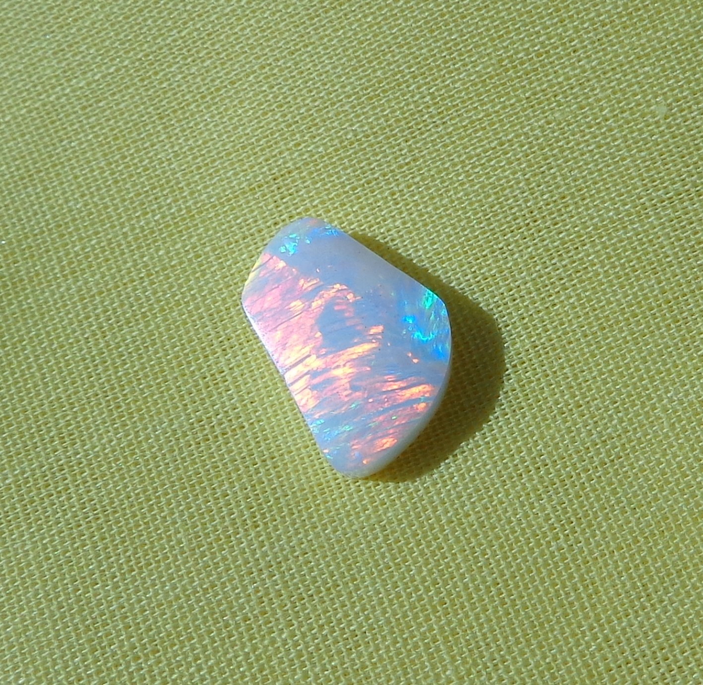 Spencer Idaho Opal Solid 9X15 mm with Unique Pattern and Red, Green, & Gold Fire