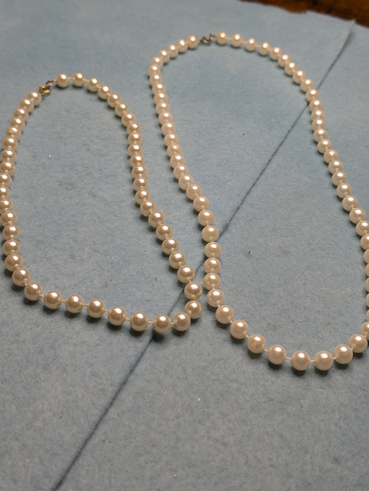 Two Elegant Strands of Classic Fashion White And Off White Faux Pearls