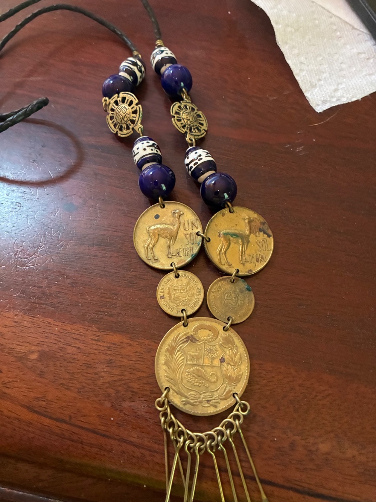 Peruvian necklace with 1946 and 1961 un sol de oro
