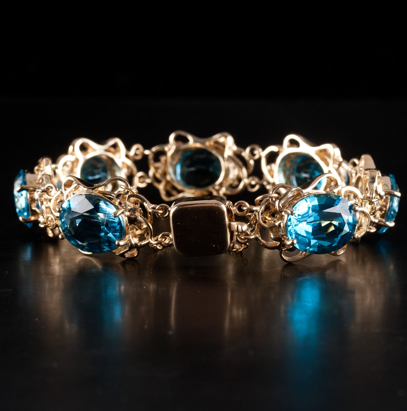 14k Yellow Gold Large Oval Swiss Blue Topaz Bracelet 42.0ctw 29.6g 6.5″ Length