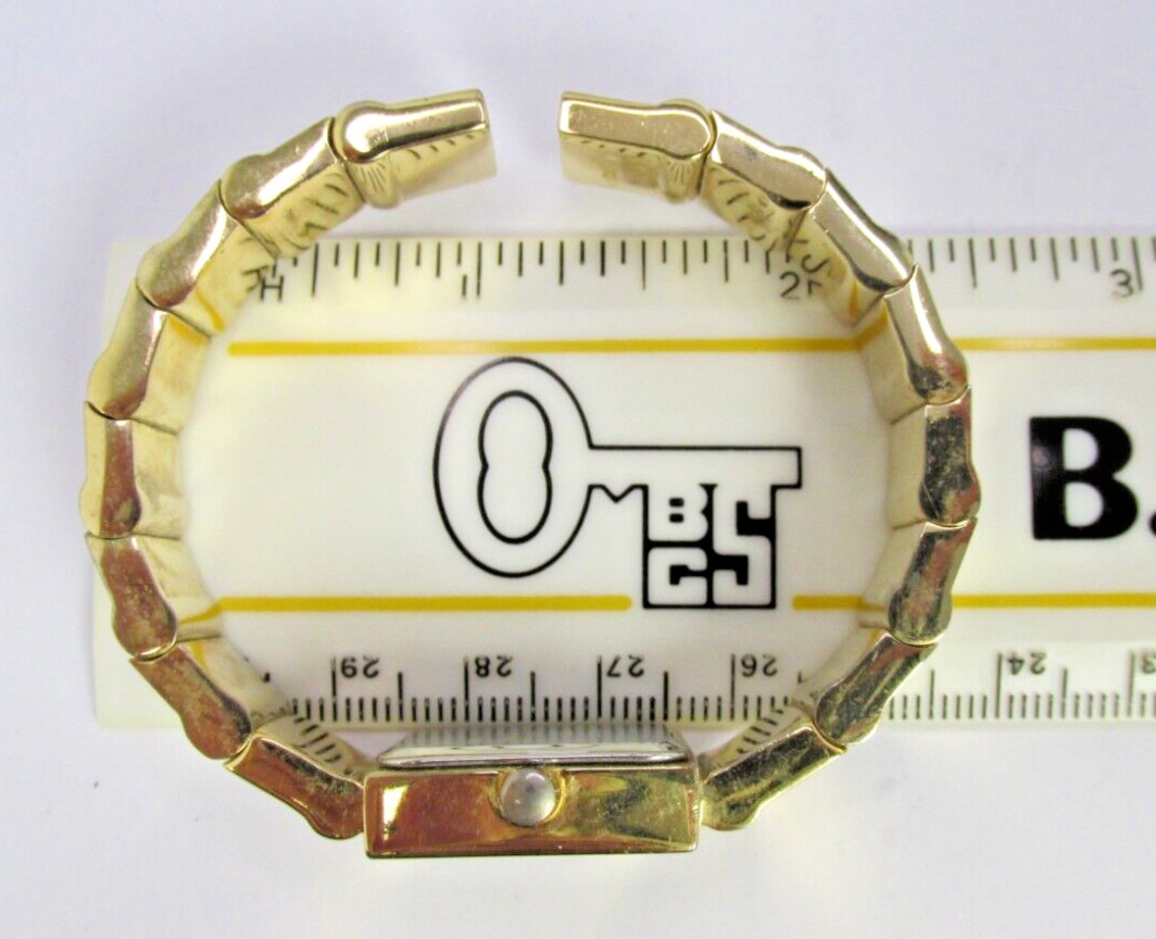 Joan Rivers Watch Gold Tone Cuff Hinged V377(20805-Time)