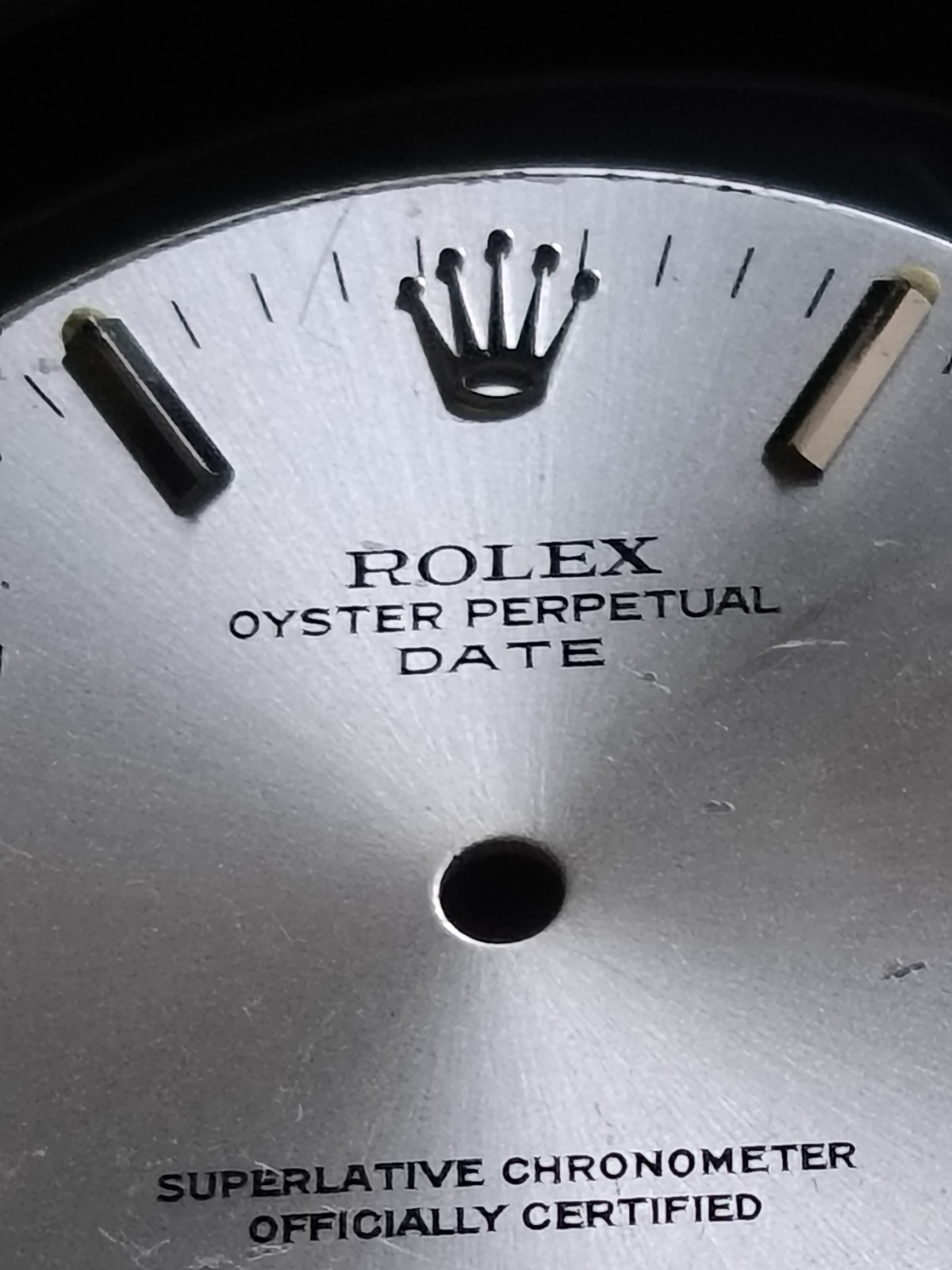 Rolex Oyster Perpetual Date Silver Metal Dial with Non-Numeric Hour Marks pn S2