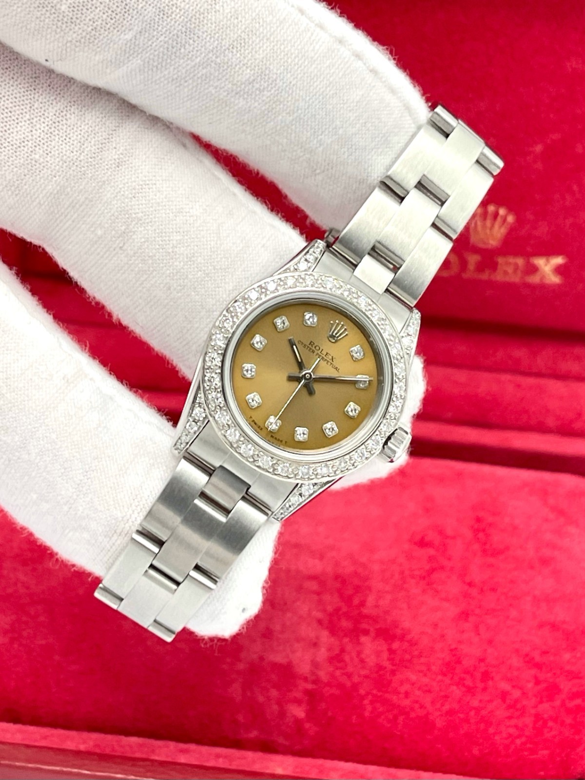 Rolex Oyster Perpetual 67180 24mm Salmon Dial Diamond Bezel Diamond Lugs Box
