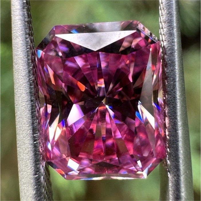 3 carat 5 x 7 mm pink emerald cut moissanite (passes diamond test)