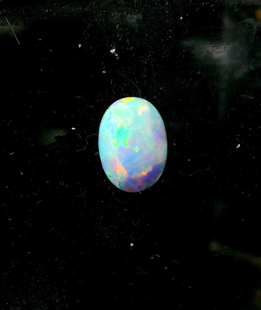 0.36ct Oval Shape White Blue Multi-Color Opal 7 x 5 mm