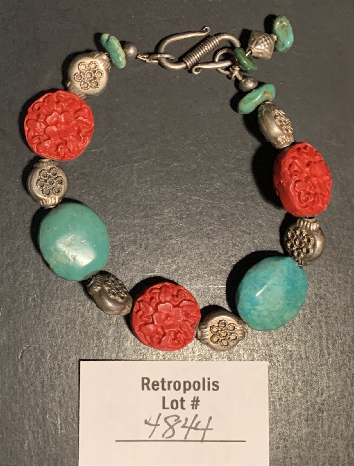 Turquoise & Carved Coral or Red Colored Bead Bracelet