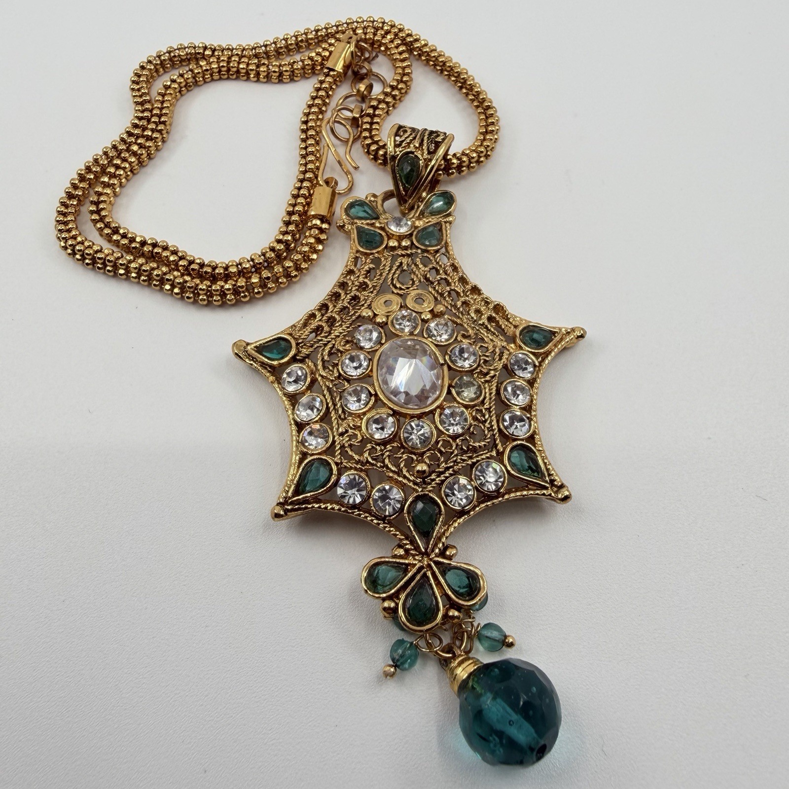 Gold Tone Ornate Multi Pointed Pendant Accented Clear Teal Rhinestone 16”
