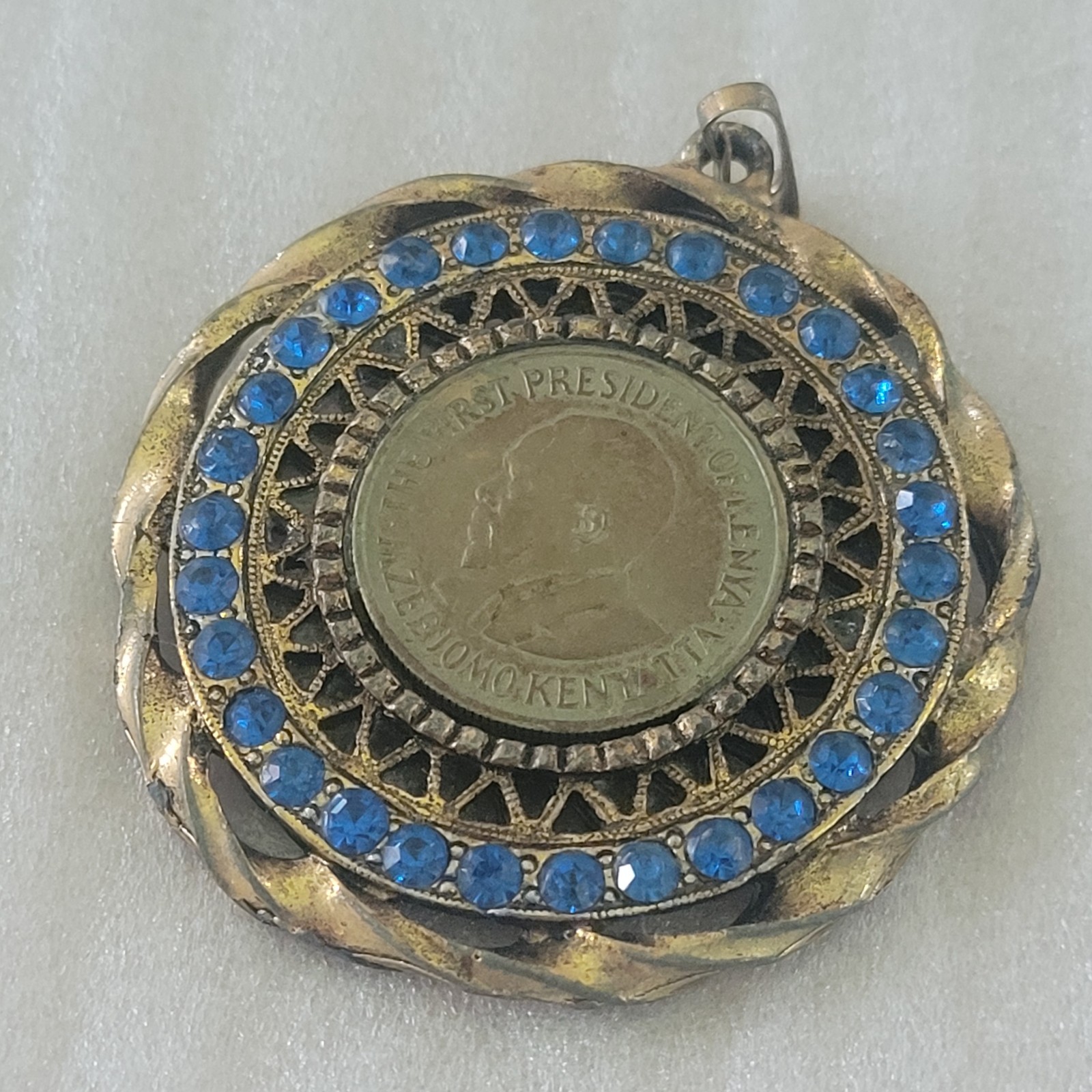 Vintage Kenya Mzee Jomo Kenyatta Coin Pendant Blue Rhinestone Halo Gold Tone