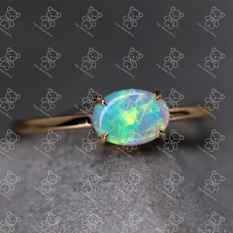 18K Yellow Gold Engagement Ring featuring an Oval Shaped Australian Solid Opal