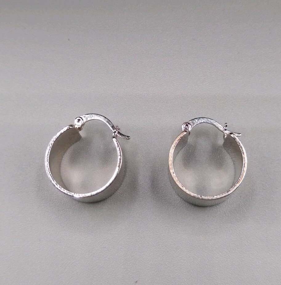 Silver Tone wide flat small hoop earrings marked ACI CN for pierced ears