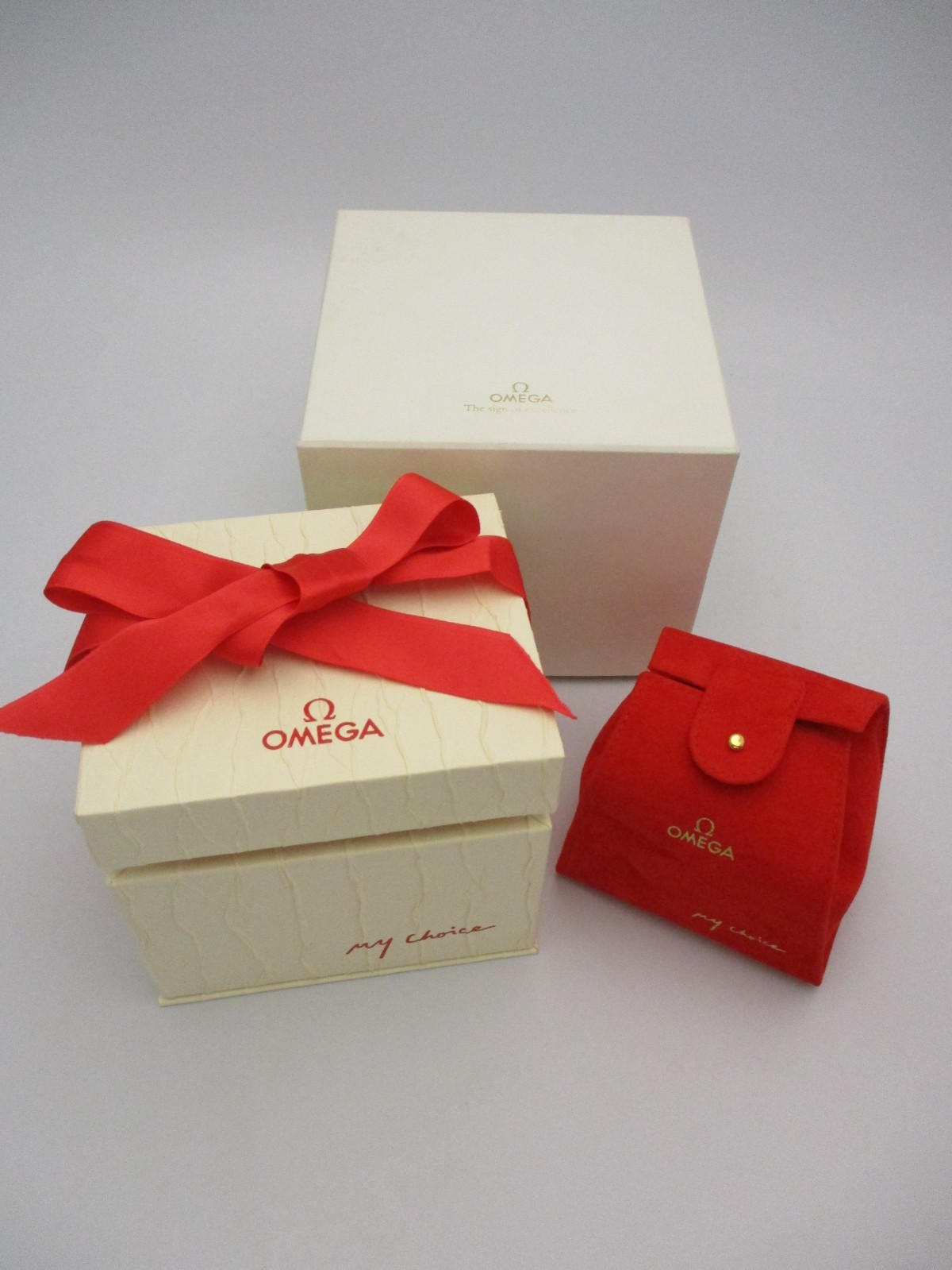 OMEGA White/Cream Watch Box Set with Red Interior Pouch Pillow Ribbon + Cartons