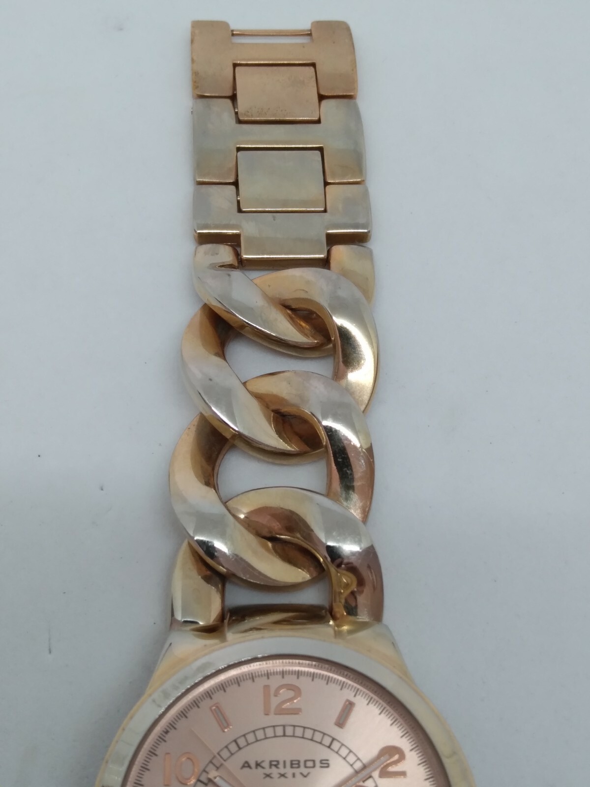 Akribos XXIV AK531RG Women’s 38mm Rose Tone Crystal Accent Multifunction Watch