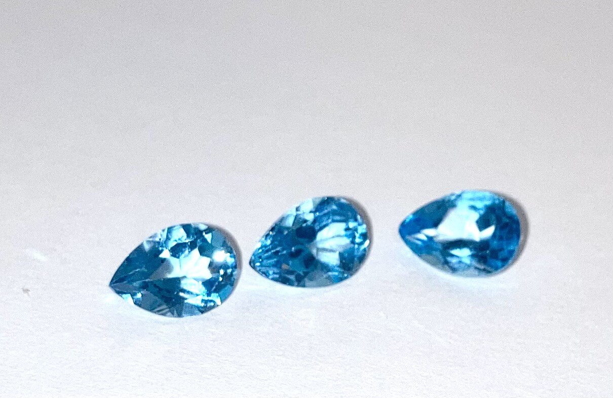 Topaz Swiss Blue 9 x7 mmm Pear shaped stones set of 3 approx 25 carats
