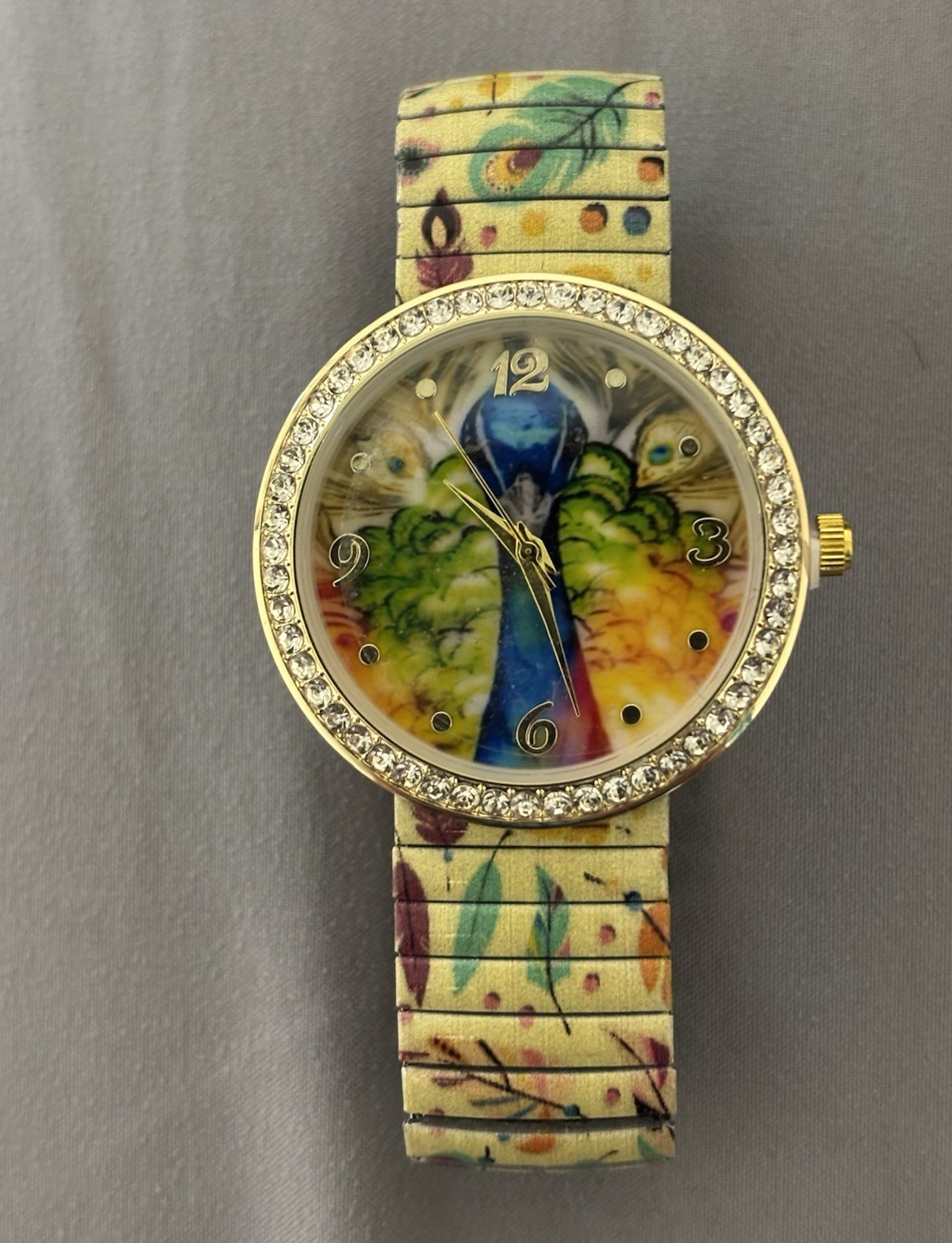 Strada Women’s Quartz Analog Watch Peacock Dial Crystal Bezel Expansion Bracelet