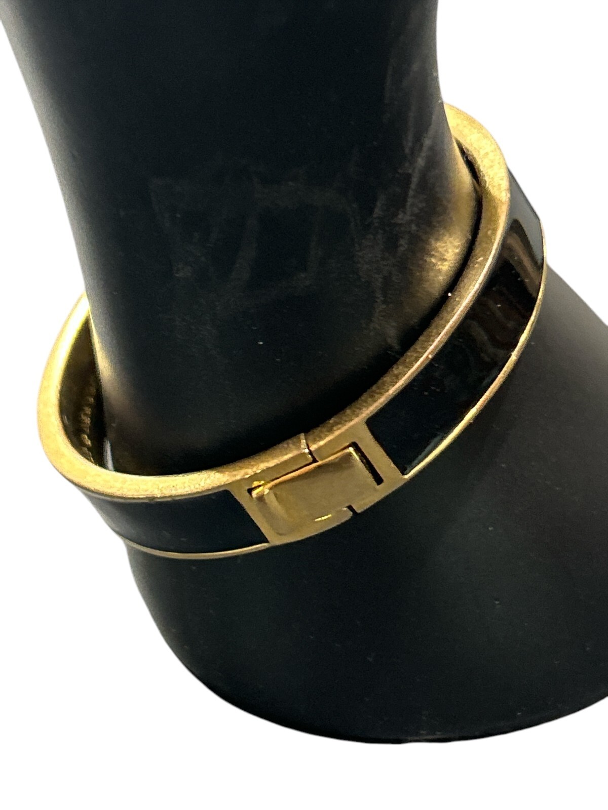 Kate Spade Black and gold Bangle Oval shape