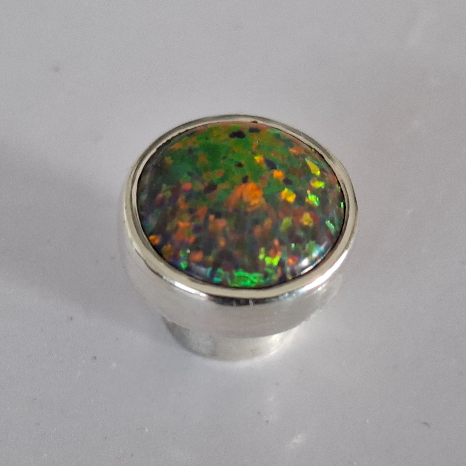 – Beautiful synthetic opal head set in silver for Charlotte 21 –