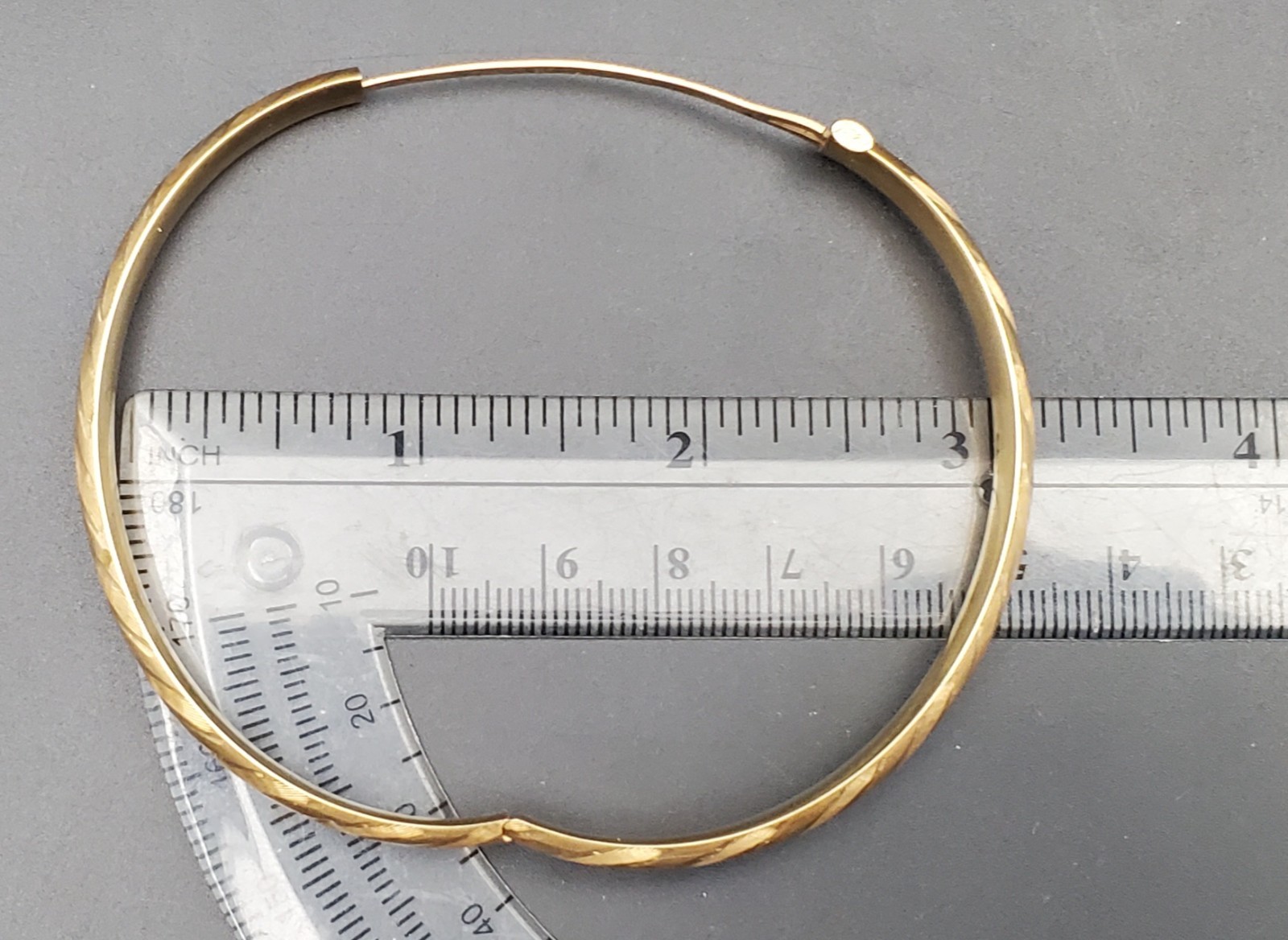 14K Bangle Bracelet, Open Hinge Design, Diamond Cut Finish 1/4 inch wide.