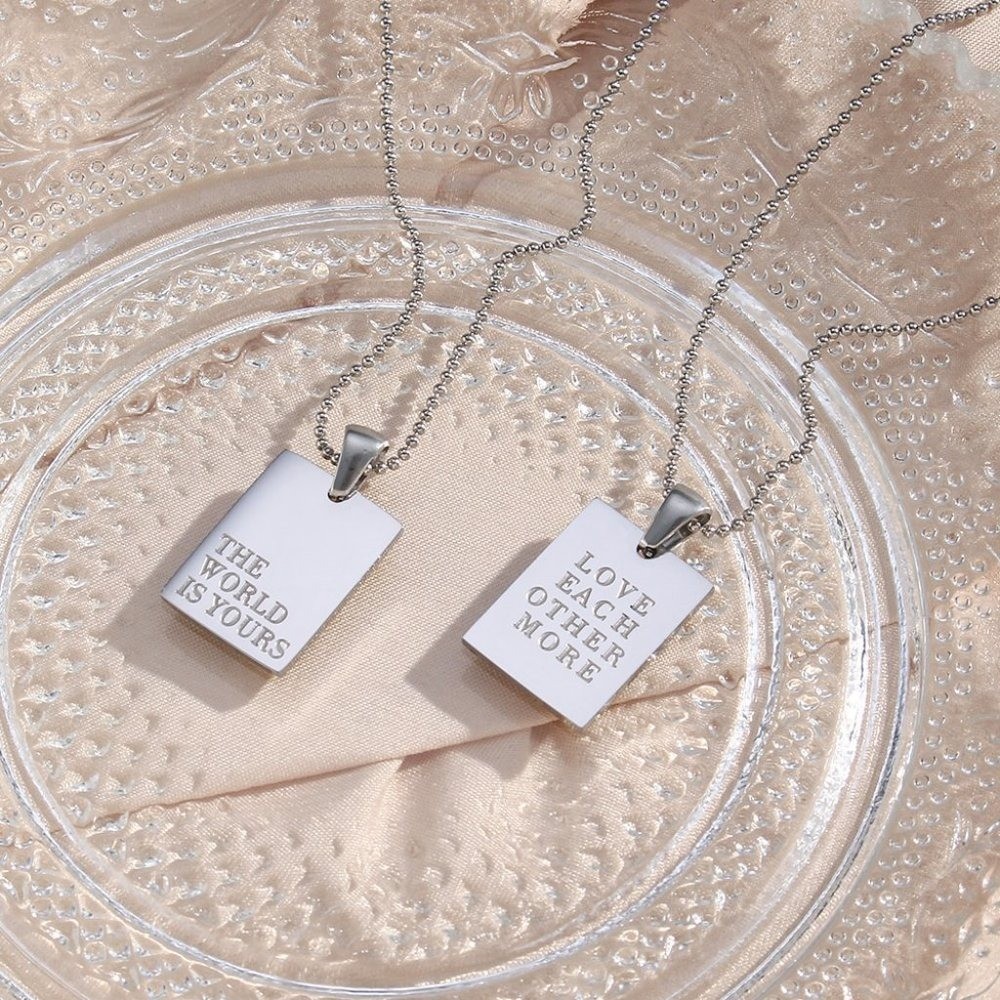 The World Is Yours Pendant Necklace 18K White Gold Plated Stainless Steel