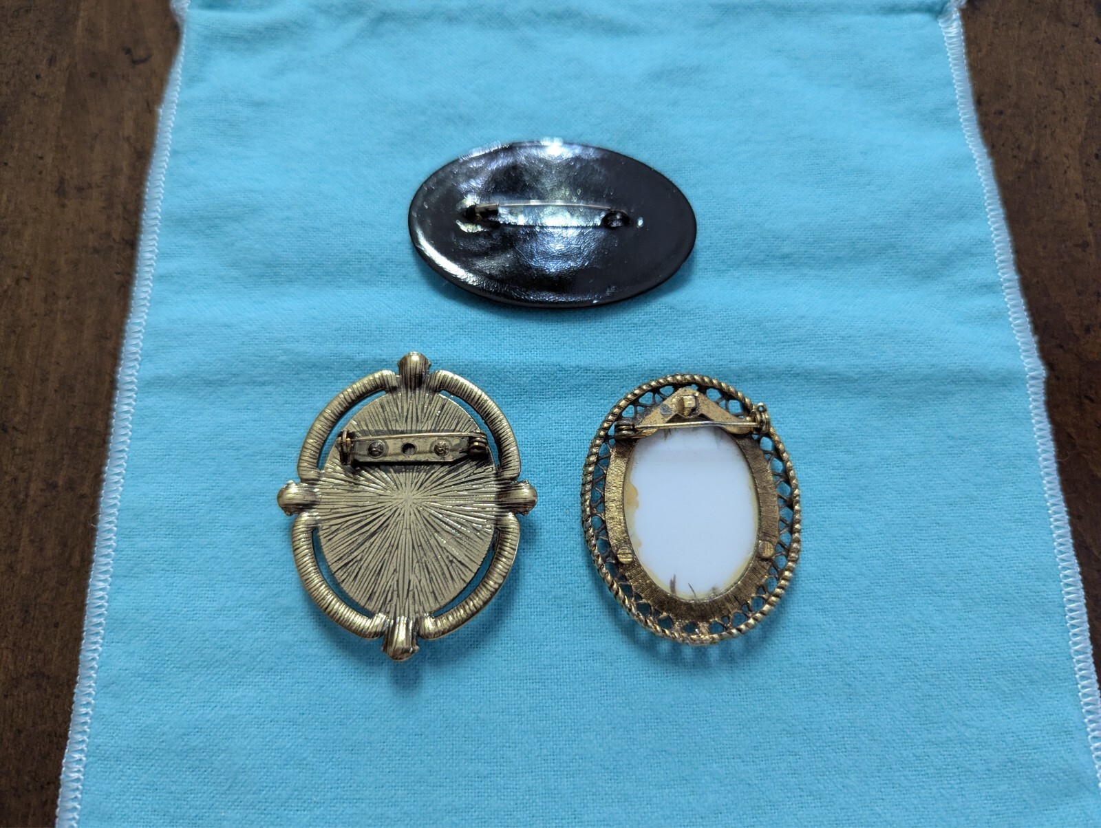 LOT/3 diff OVAL BROOCH/PINS w/diff FLORAL DESIGNS 2 Metals/1 RUSSIAN Black Wood
