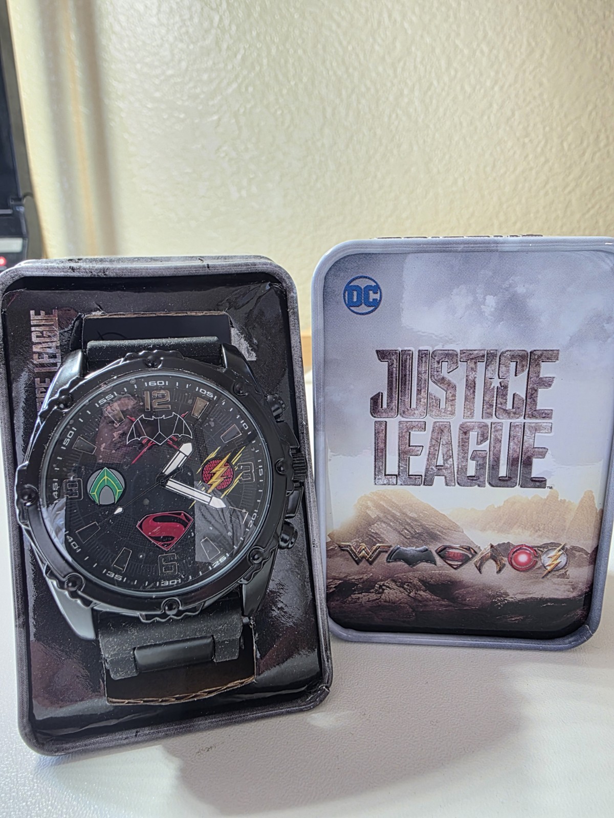 DC Justice League Men’s Quartz Analog Watch Black Silicone Band w/ Tin Case