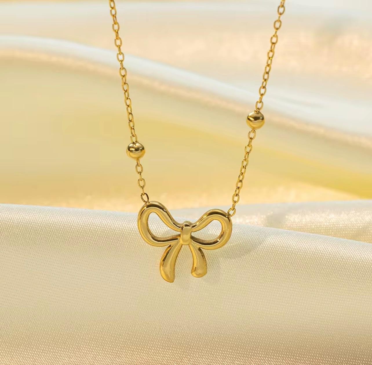 316L Stainless Steel Simple and Lovely Gold Sweet Bow Pendant Necklace Jewelry